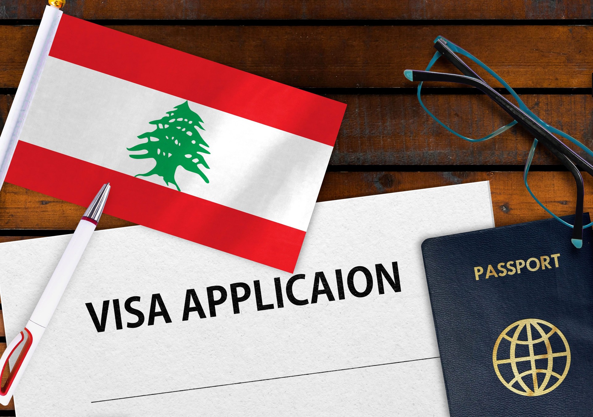 Flag of Lebanon, visa application form and passport on table
